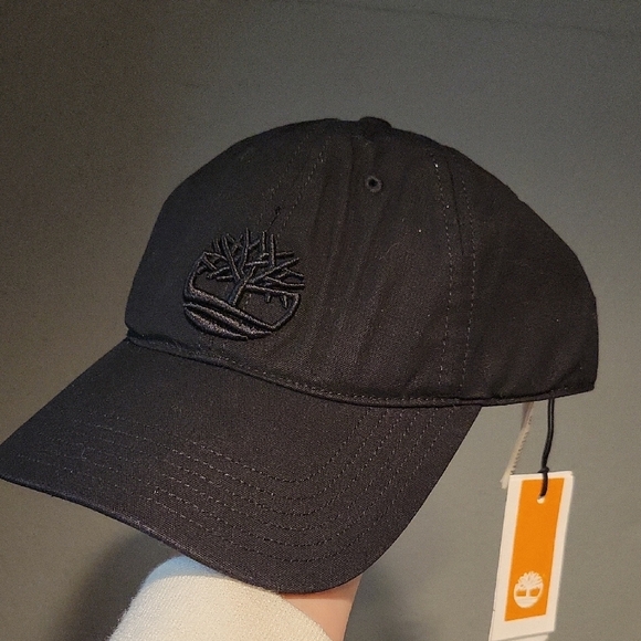 NEW TIMBERLAND ALL BLACK EMBROIDERED TREE SNAP BACK DAD BASEBALL HAT NWT - Picture 1 of 7